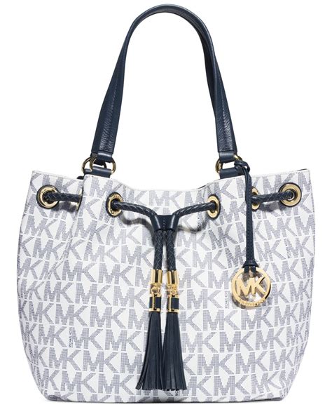 michael kors round signature change purse|Michael Kors large signature tote.